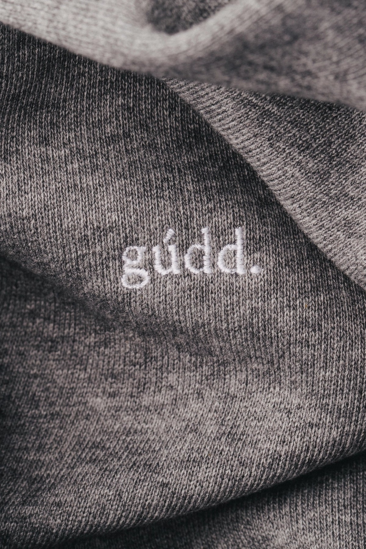 the grey hoodie.