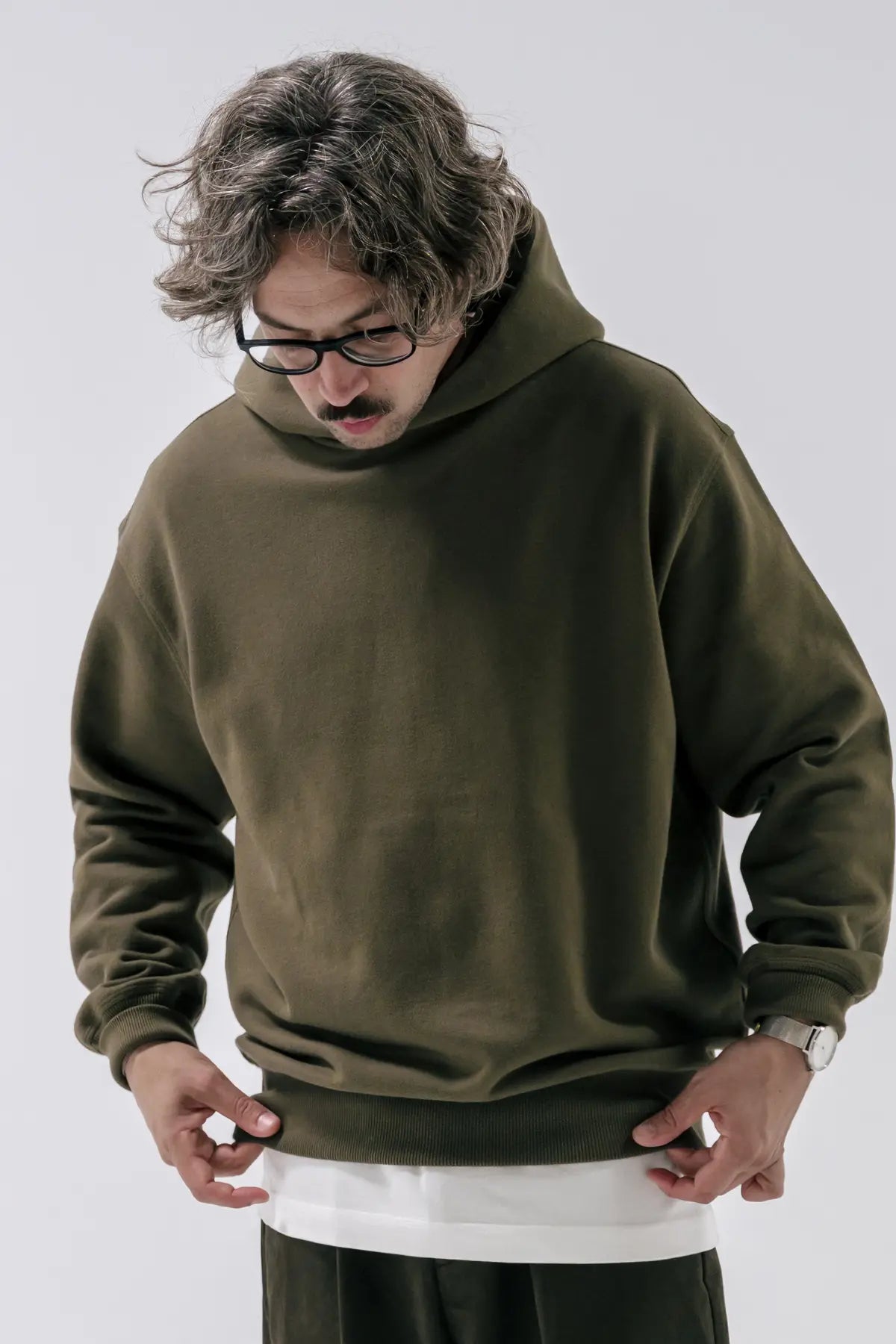 the olive hoodie.