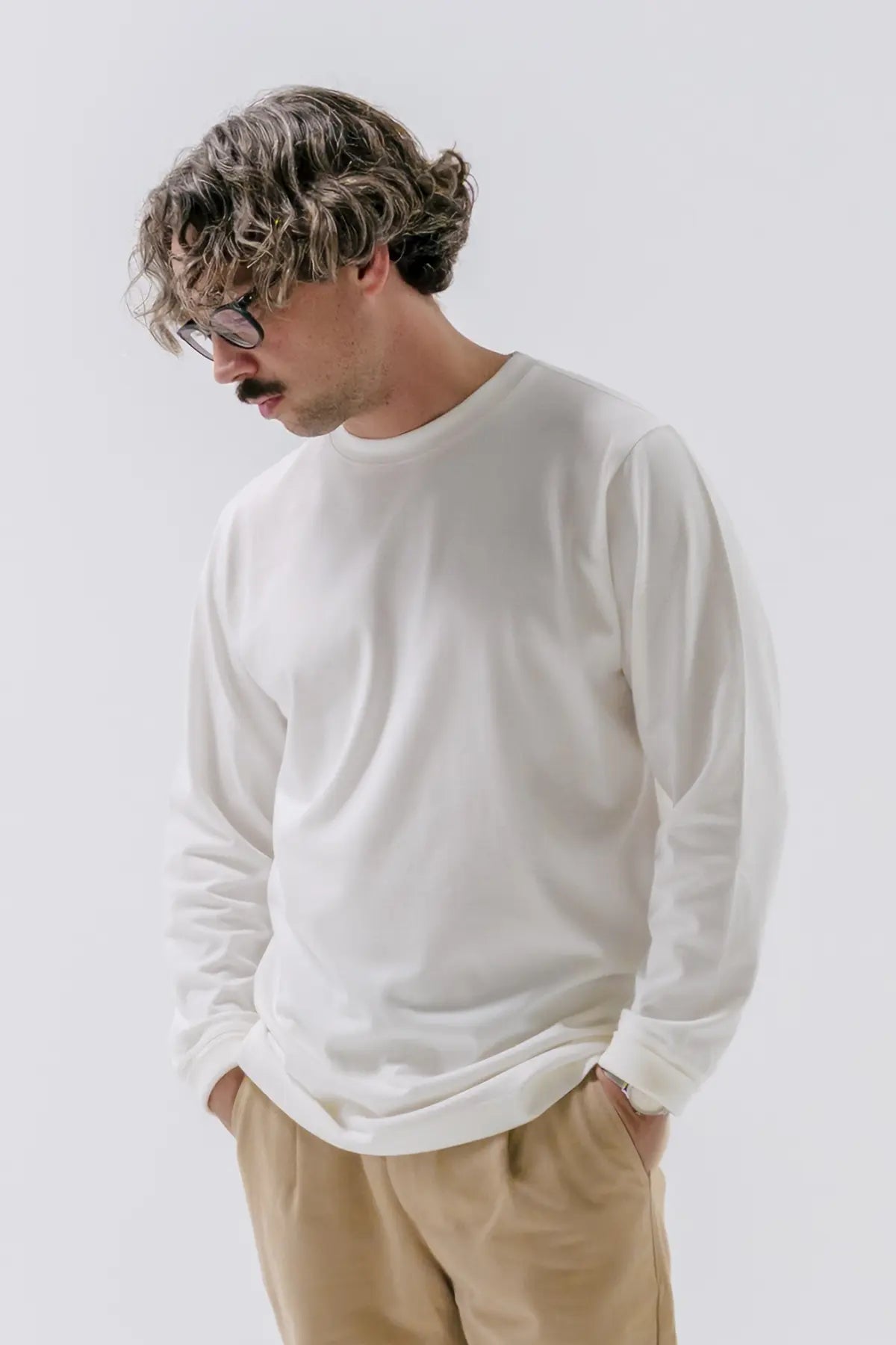 the white longsleeve.