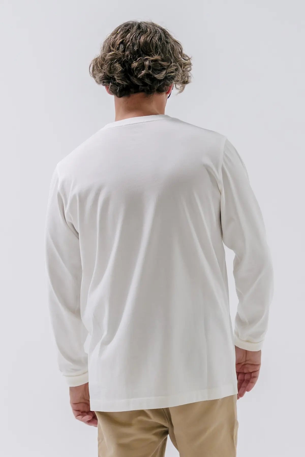 the white longsleeve.