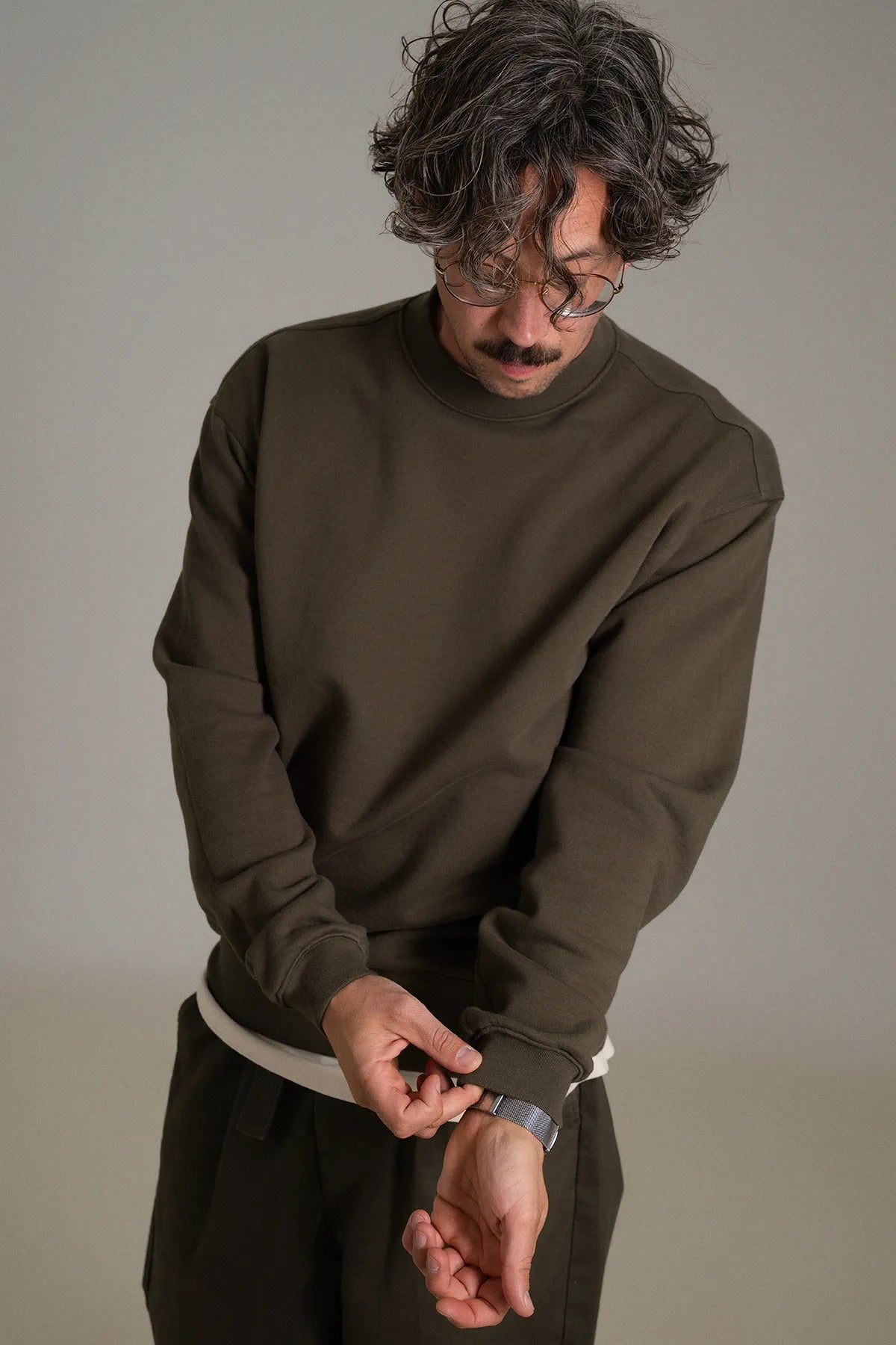 the olive crewneck.