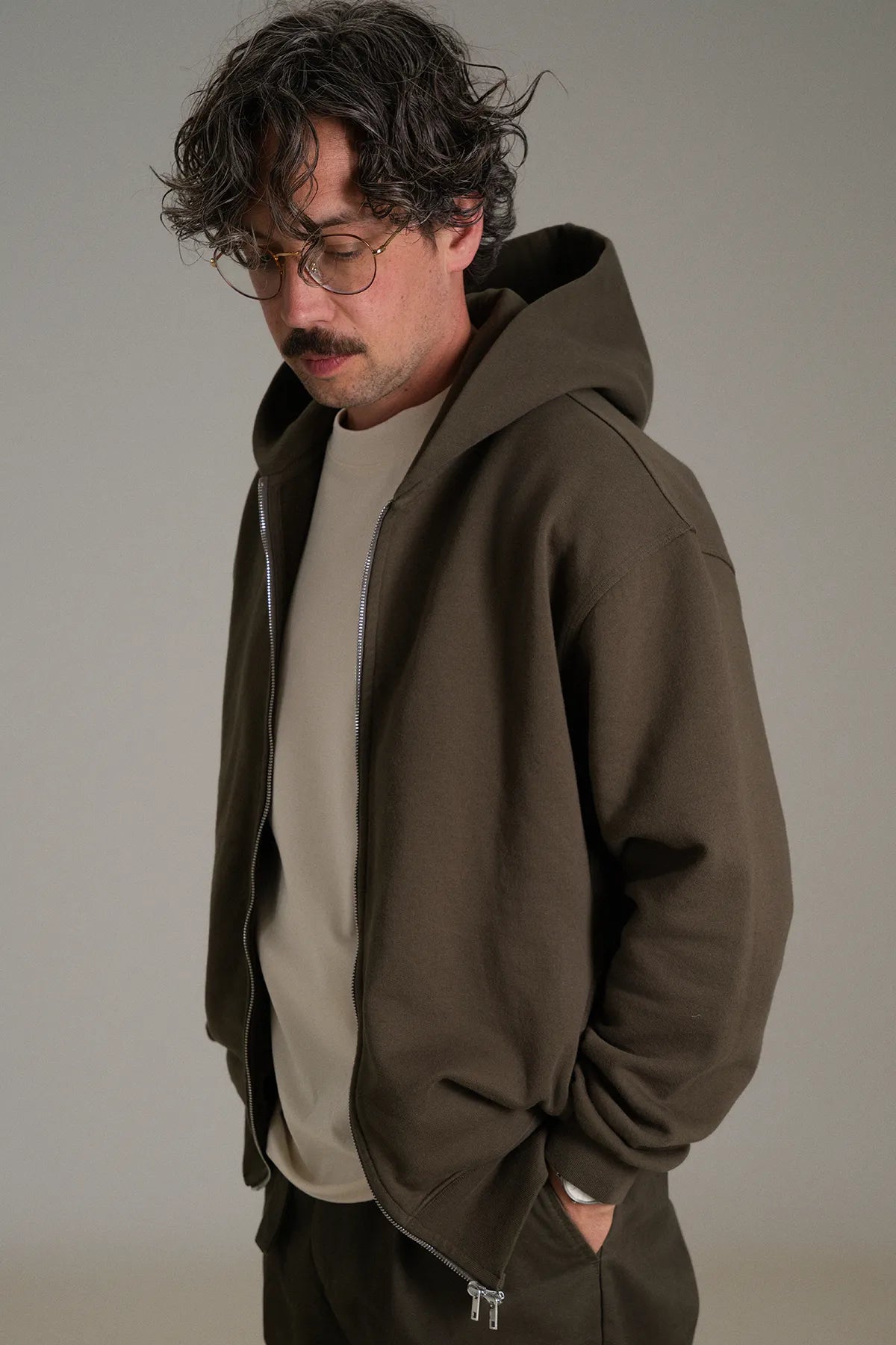 the olive zip hoodie.