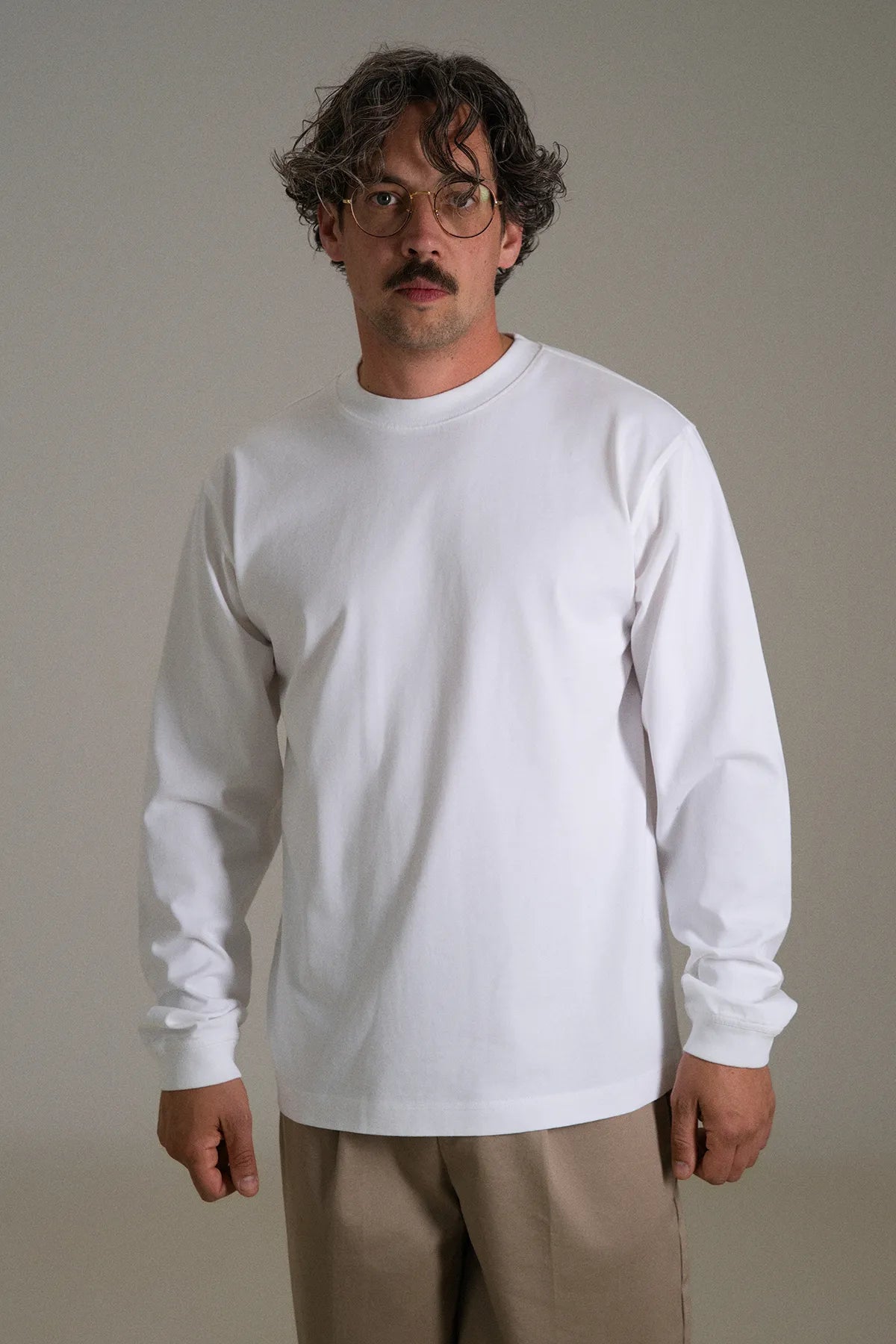 the white longsleeve.