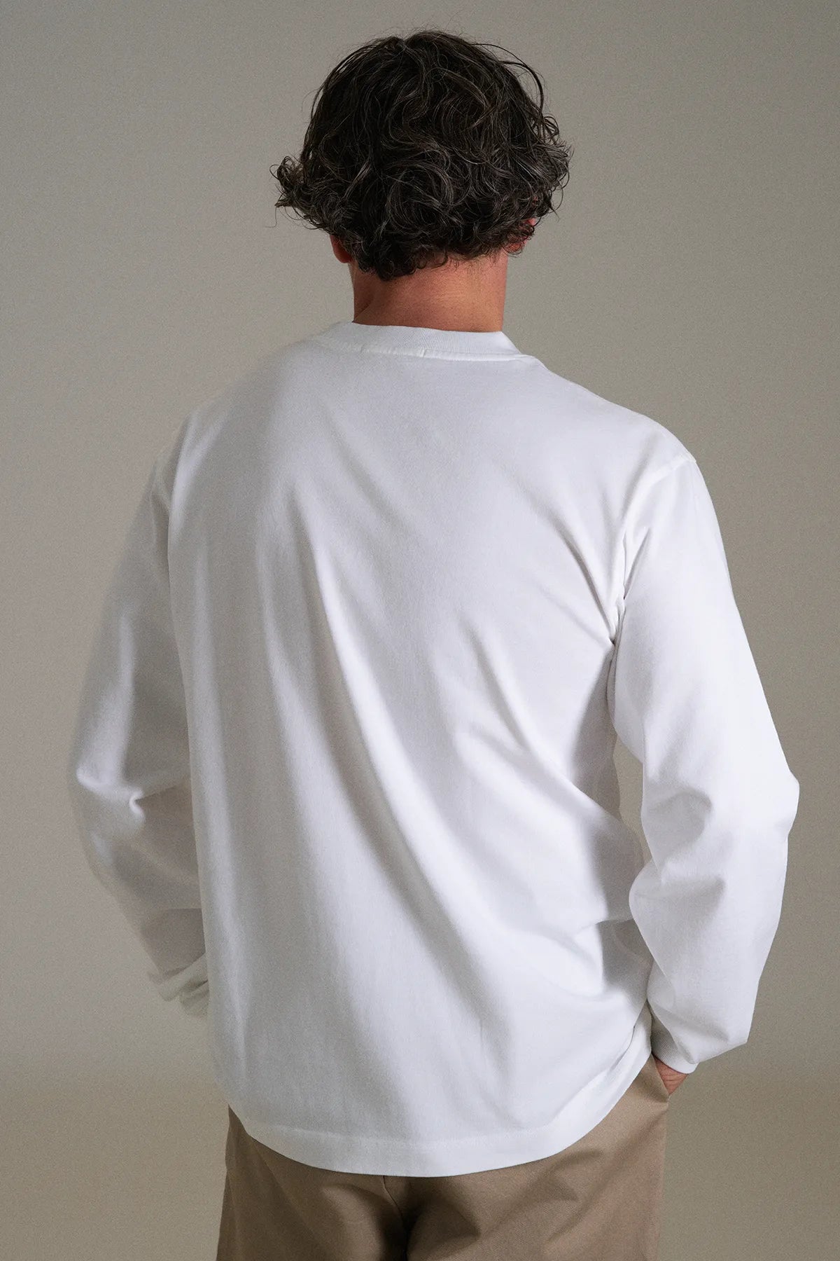 the white longsleeve.