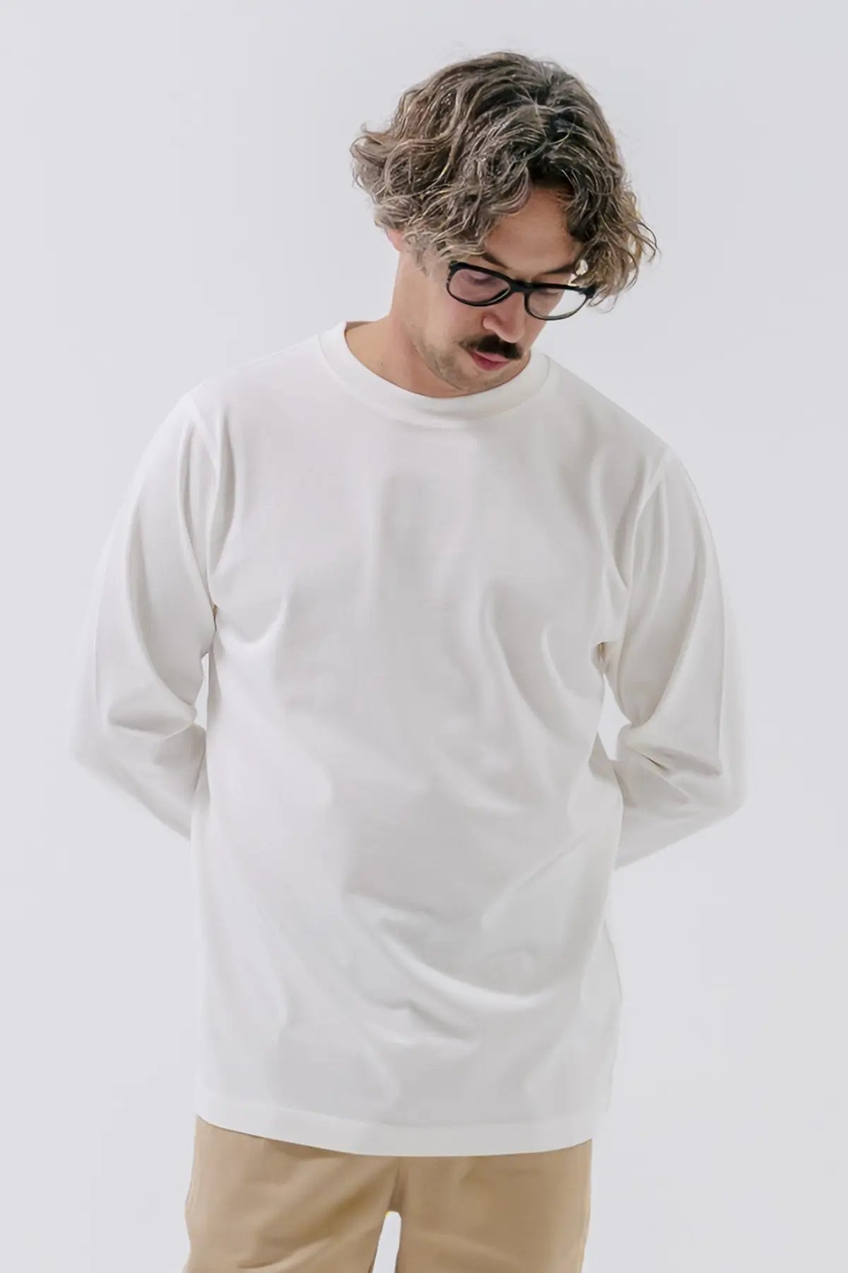 the white longsleeve.