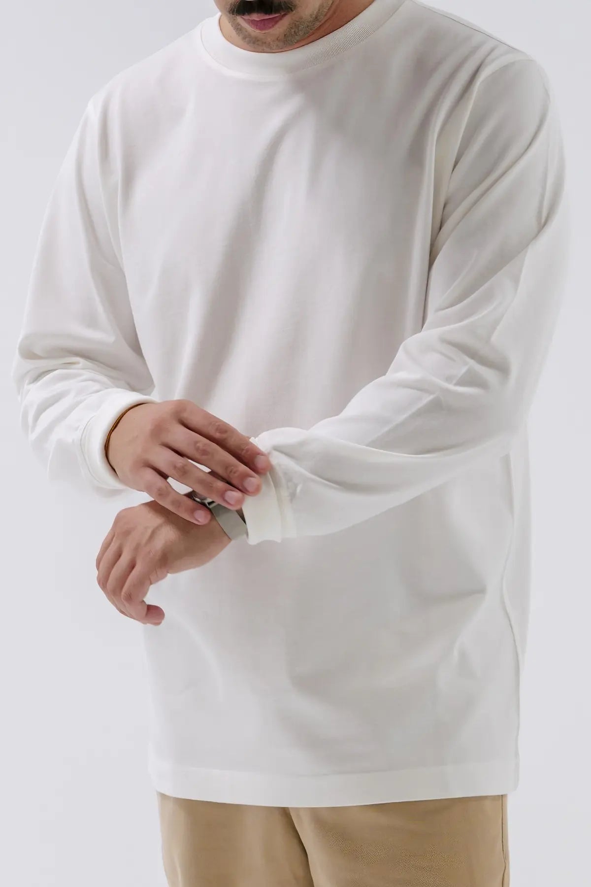 the white longsleeve.