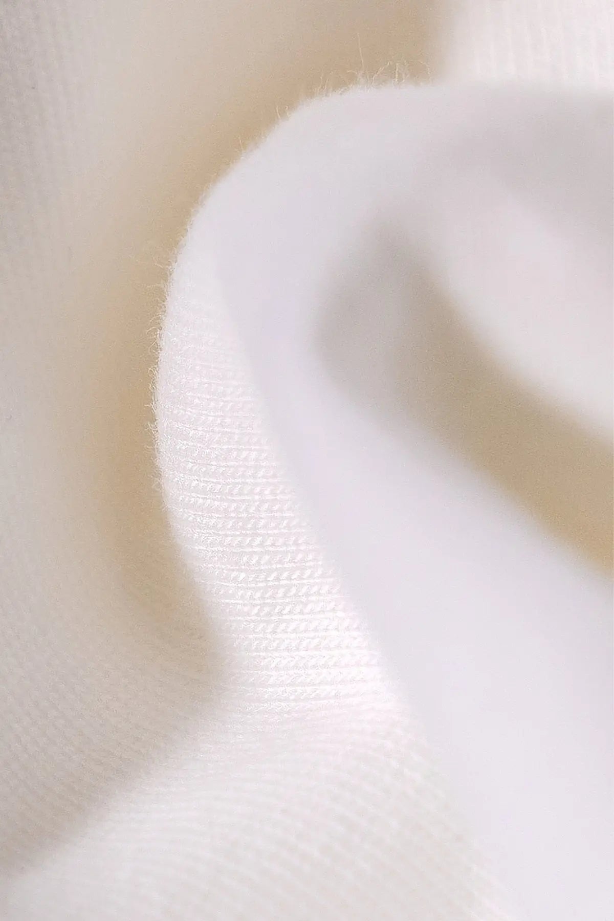 the white longsleeve.