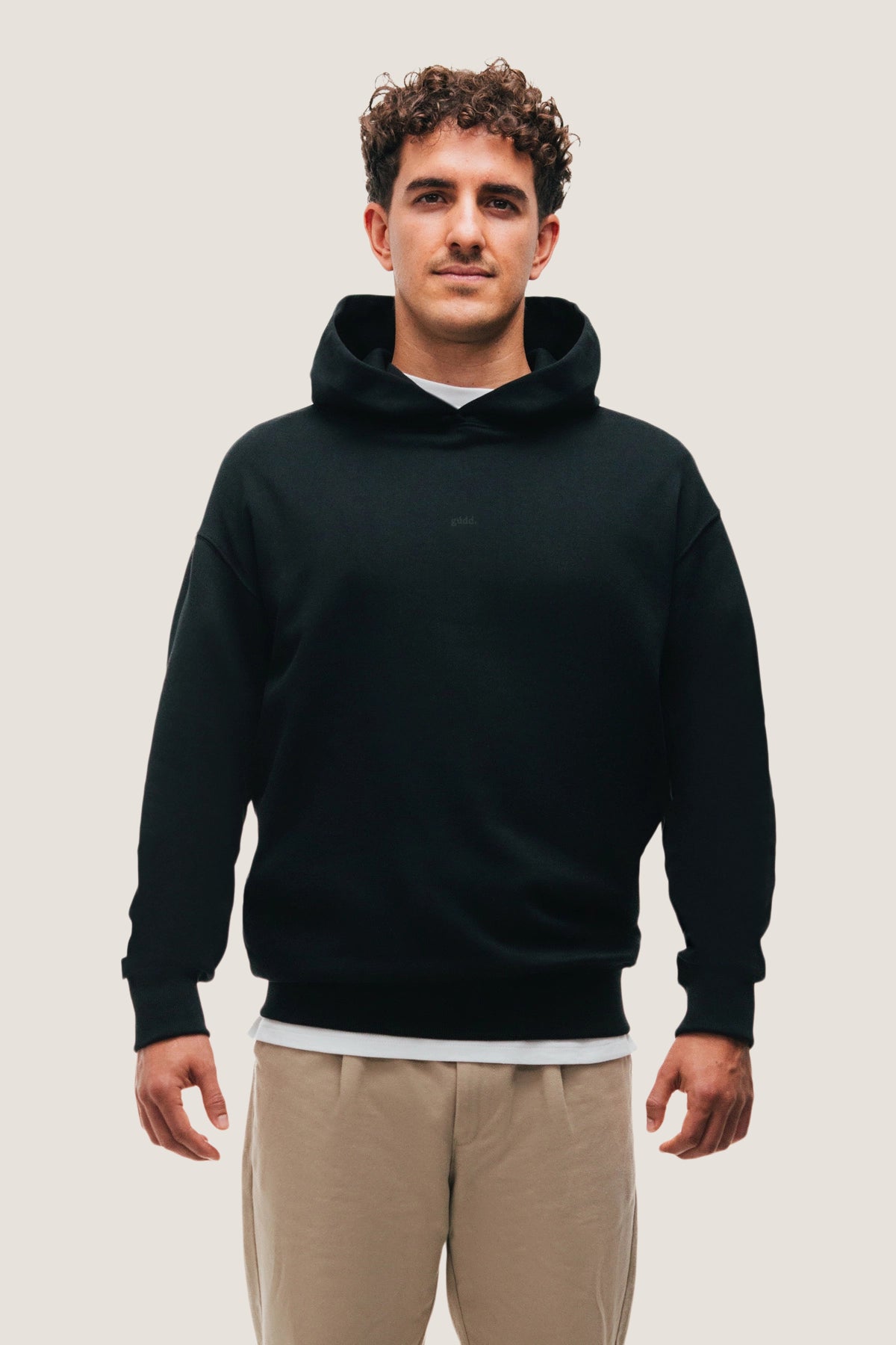 the black hoodie.