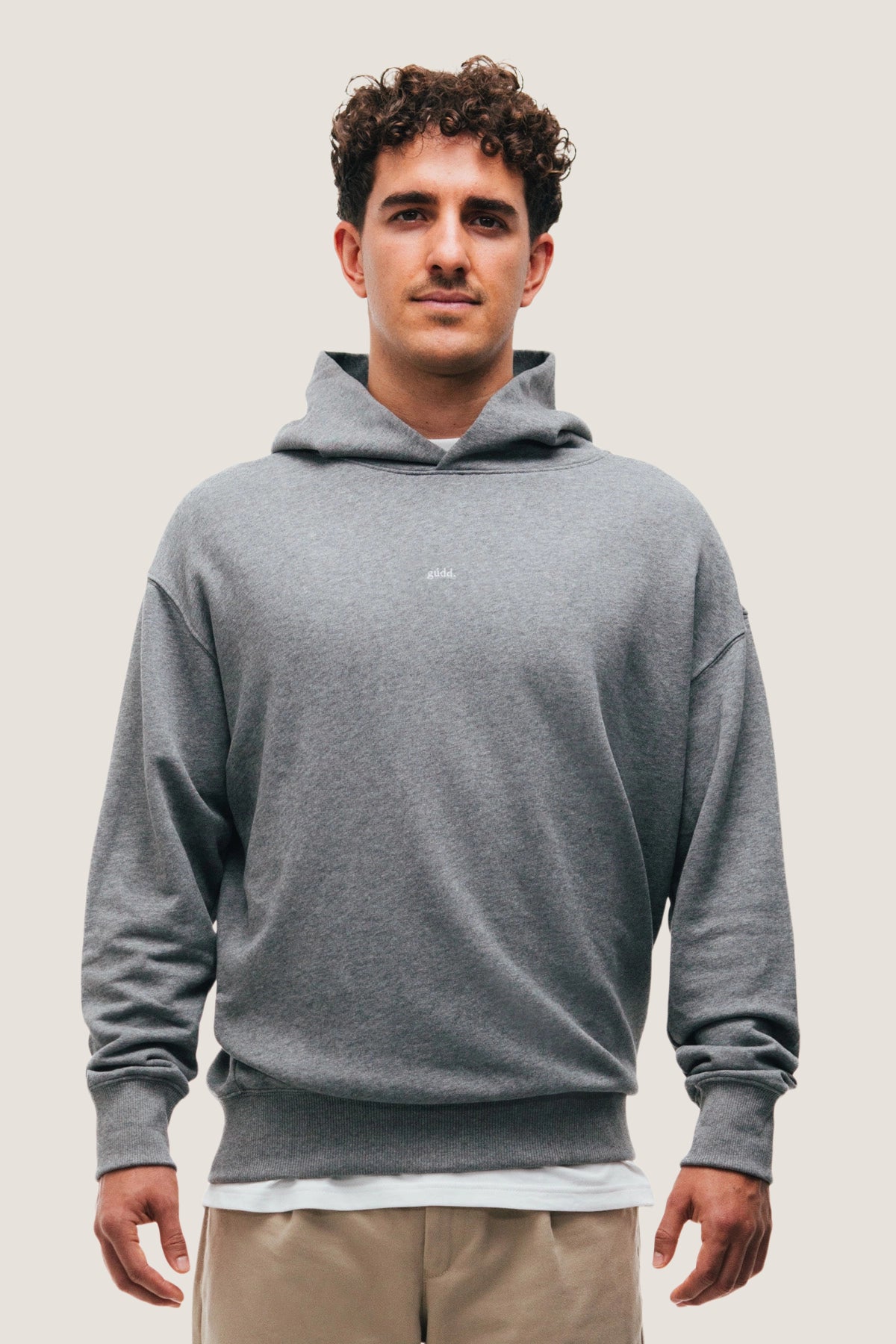 the grey hoodie.