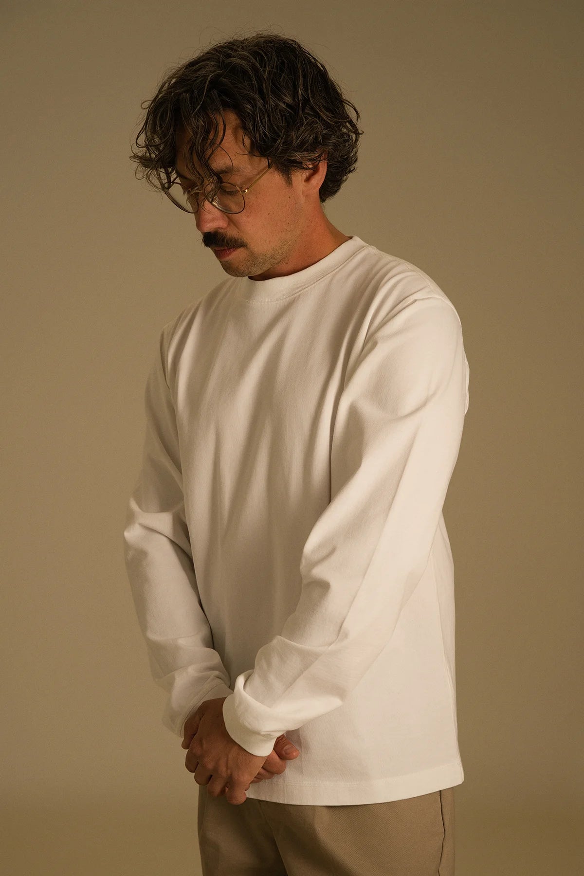 the white longsleeve.