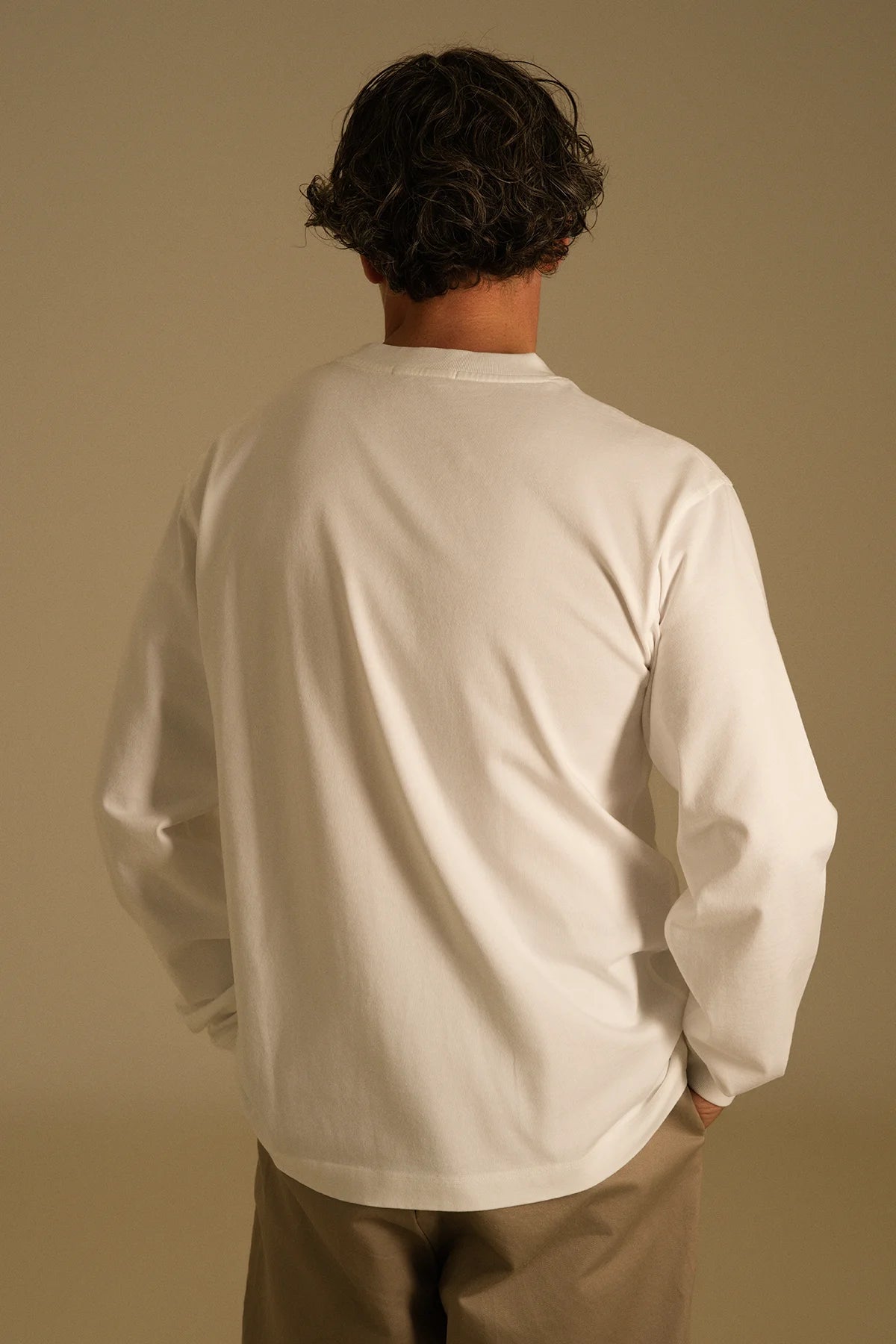 the white longsleeve.