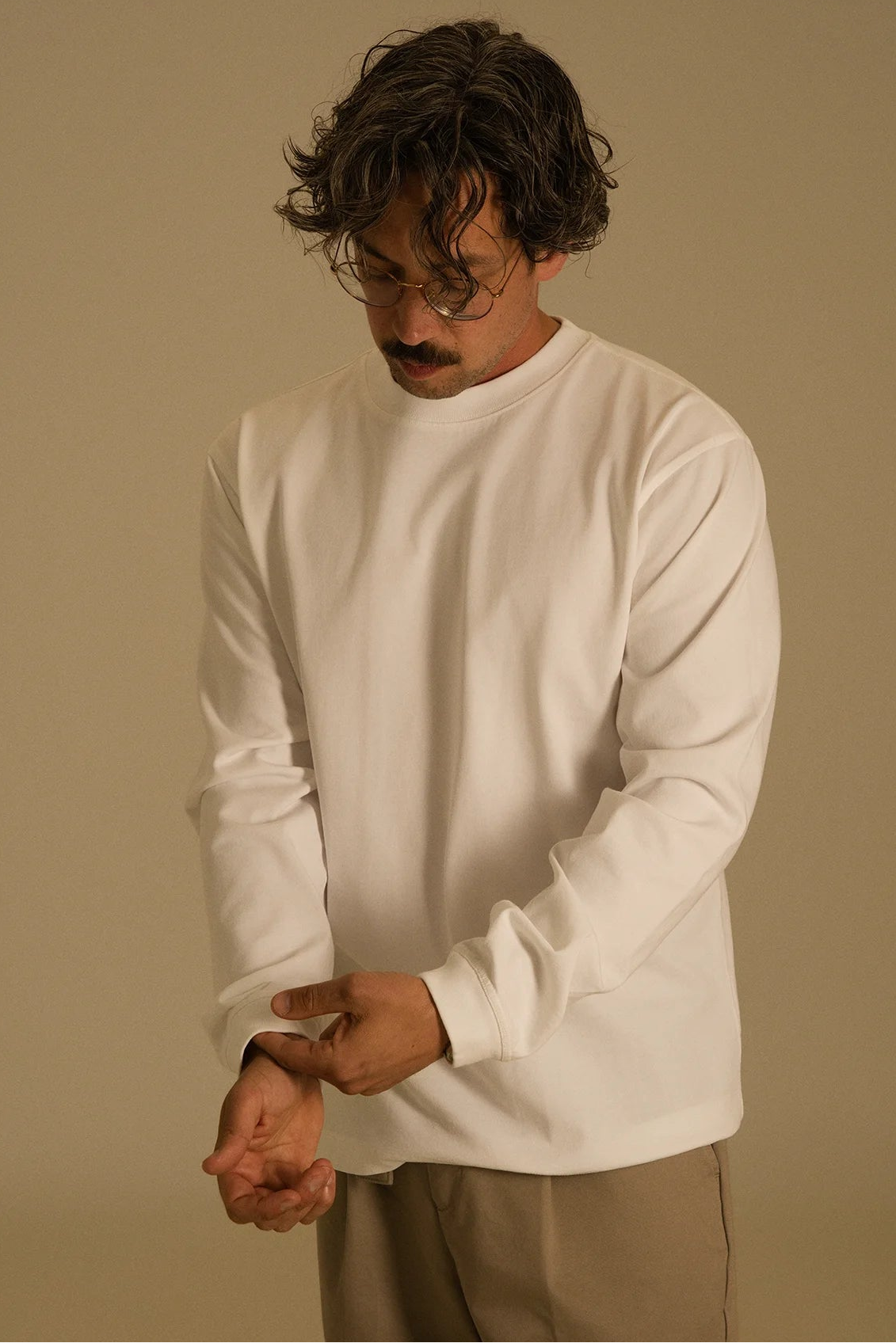 the white longsleeve.