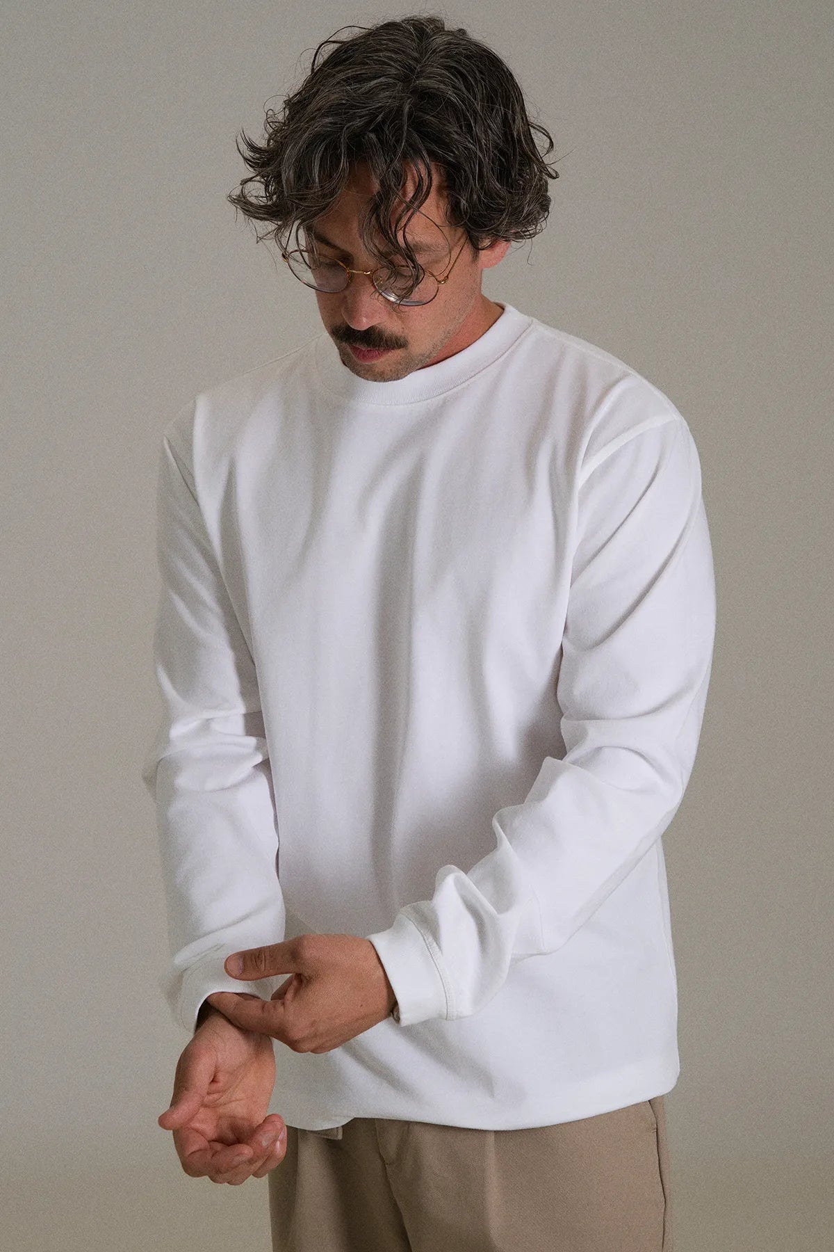the white longsleeve.
