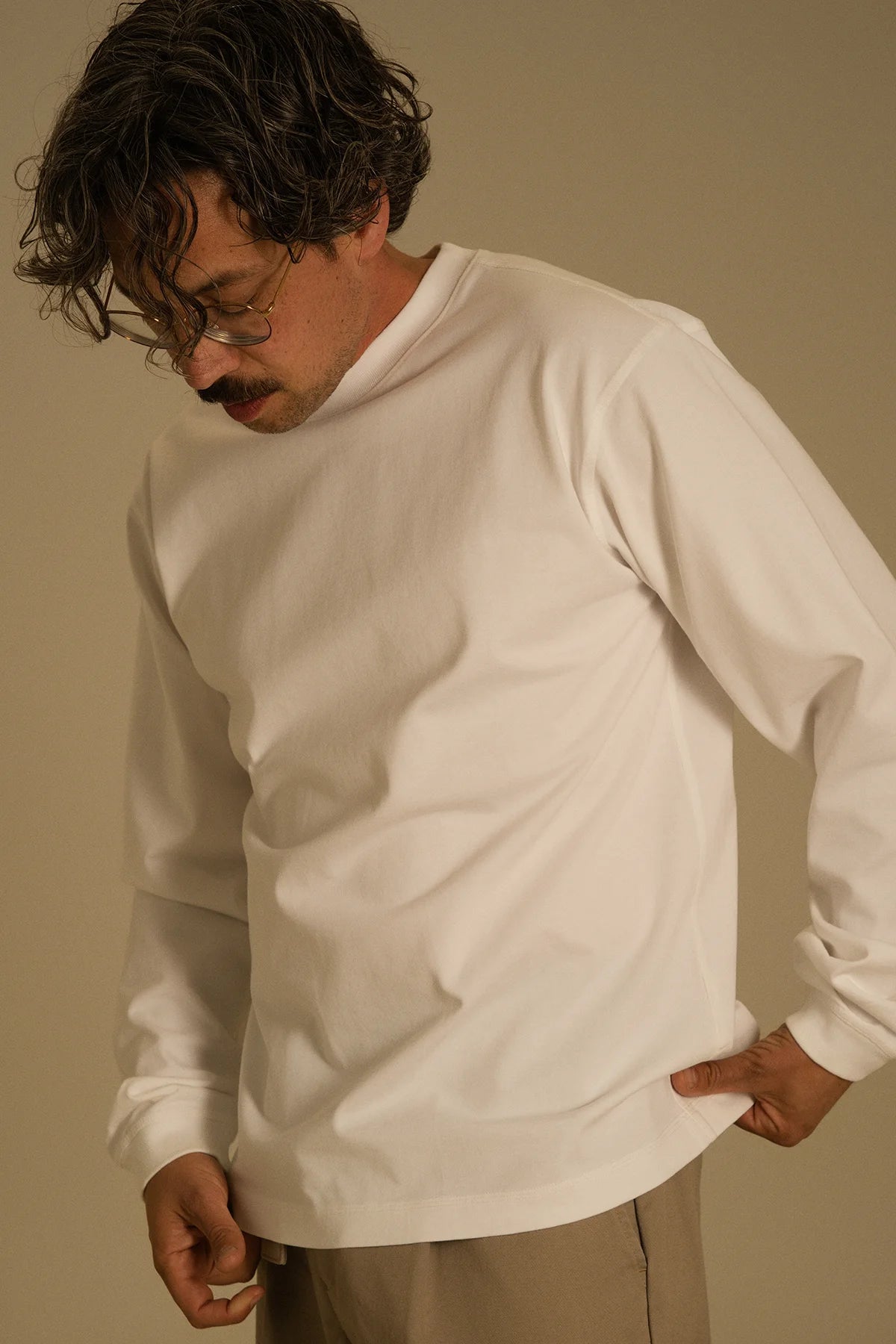 the white longsleeve.