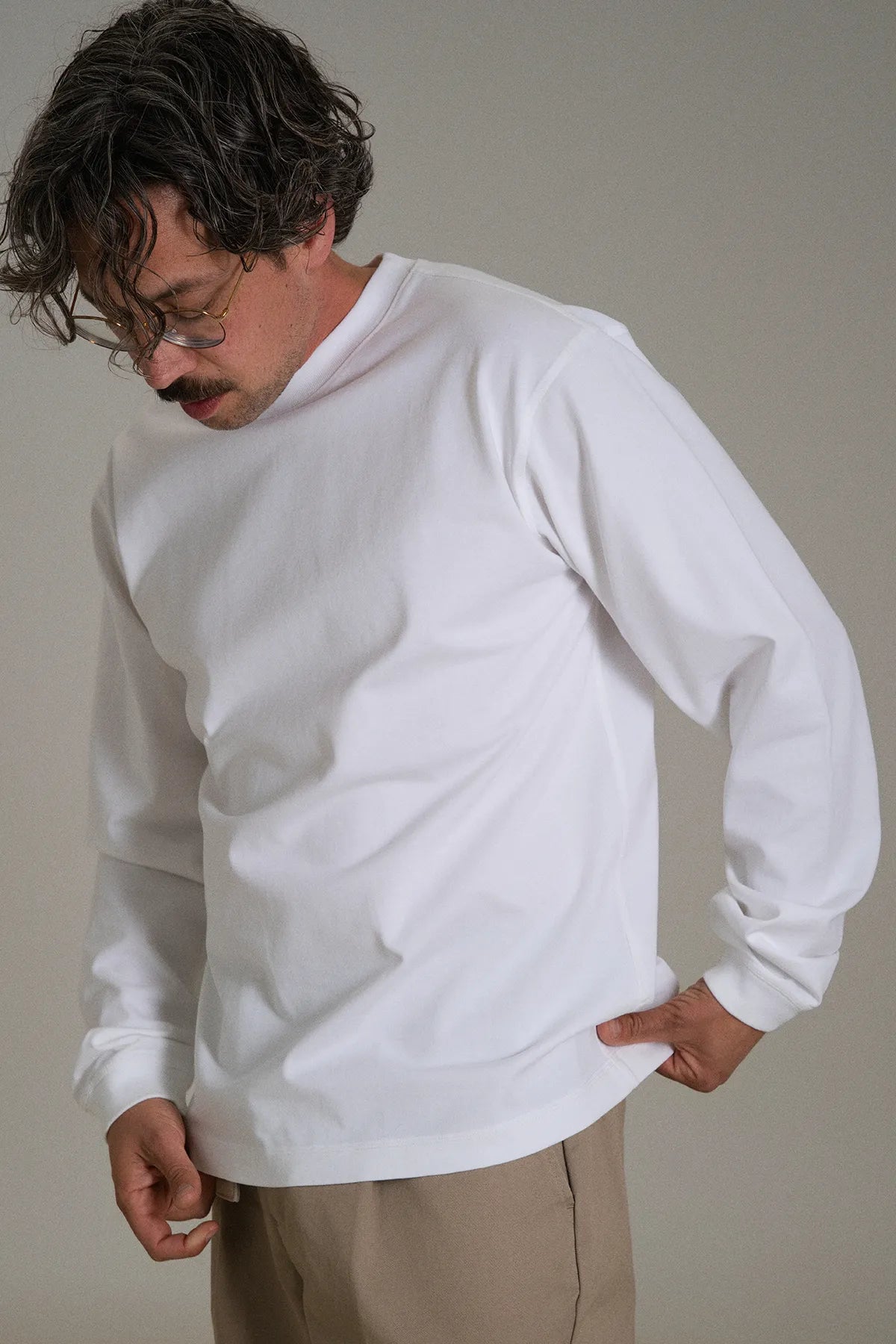 the white longsleeve.